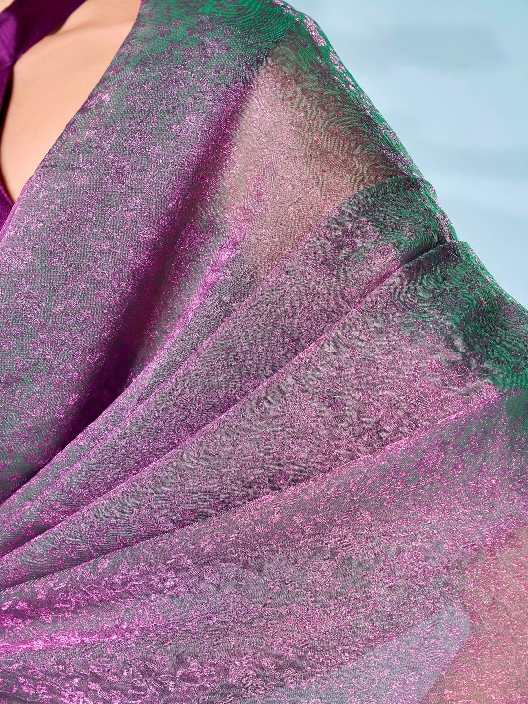 Two tone pink and green colored woven saree with tassles on pallu